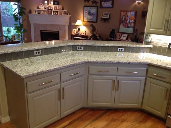 Kitchen bar, white cabinets and stone countertops