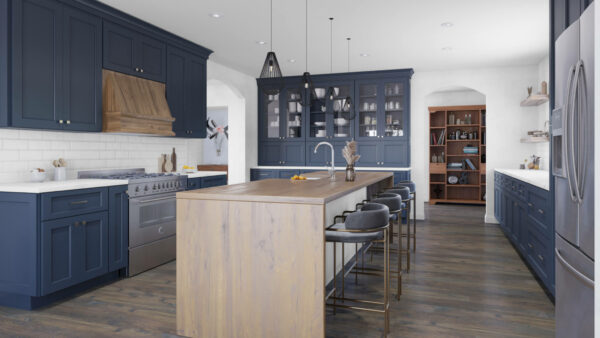 Kitchen with dark blue cabinets, natural wood colored island and hood.