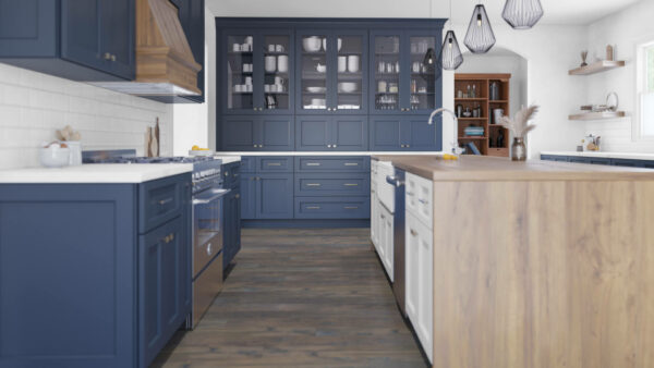 Kitchen with dark blue cabinets, natural wood colored island and hood.