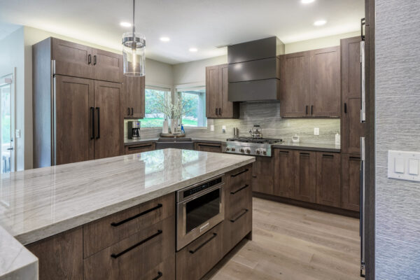 Contemporary kitchen showcasing wood cabinetry